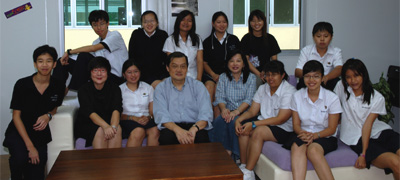 Philip Poh (4th from left) and Evelyn Teoh (5th from left) with some of the regulars of the Christian Fellowship