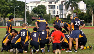 Coach Adrian briefing the team