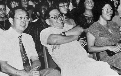 It must be funny! (photograph taken with the Vice-Principal, Mr Ang Cheng Kim, at Drama Night in 1979.)