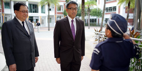 The Guest-of-Honour, Mr Chew Kwee San, inspecting the parade